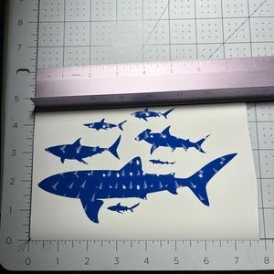 Cricut premium vinyl matte 3-D texture. Blue shark decals.